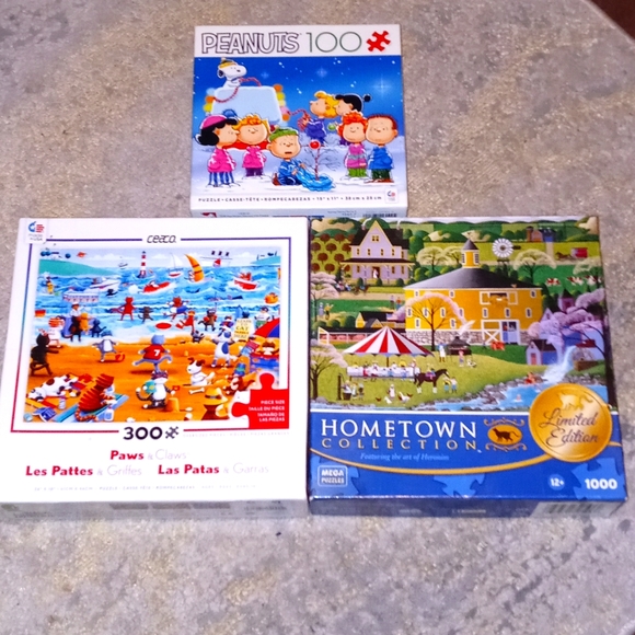 Peanuts Other - (3) Combo set of puzzles. **See pics** . @ buy the 2 & will send the 1000 piece.